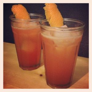 An image of the 212 cocktail submitted by n0tquitethere that contains Reposado Tequila, Grapefruit, Aperol and Orange