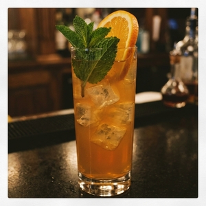 An image of the #3 Cup cocktail submitted by n0tquitethere that contains Cognac, Ginger Beer, Sweet Vermouth, Curaçao Triple Sec, Cherry Brandy, Lemon, Mint, Mint, Cucumber and Orange