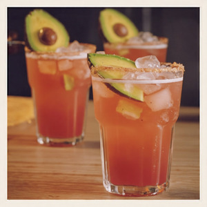 An image of the Avocado Margarita cocktail submitted by Toby that contains Grapefruit, Lime, Reposado Tequila, Mezcal, Absinthe, Agave Syrup, Tarragon, Avocado, Salt and Pepper