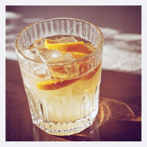 An image of the Four Forte cocktail submitted by Toby that contains Agricole Rhum, Old Monk Rum, Smith & Cross, Goslings Black Seal 151, Angostura Bitters, Orange Bitters, Whiskey Barrel Aged Bitters and Xocolatl Mole Bitters and Demerara SugarOrange