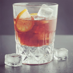 An image of the Island Old Fashioned cocktail submitted by Toby that contains Gold Rum, Falernum, Sugar Cane Syrup, Angostura Bitters and Lemon