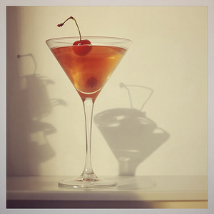 An image of the Made Man cocktail submitted by Toby that contains Rye Whiskey, Cherry Heering, Yellow Chartreuse, Fernet Branca and Cocktail Cherry