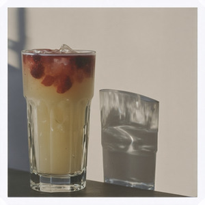 An image of the Sureau Fizz cocktail submitted by Toby that contains London Dry Gin, St Germain, Lemon, Lime, Simple Syrup, Cream, Egg, Orange Flower Water and Soda Water