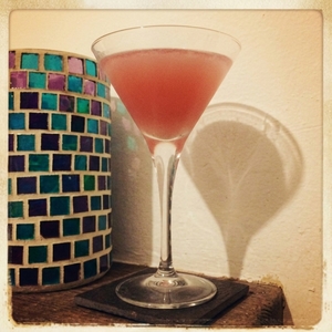 An image of the All-American Sweetheart Martini cocktail submitted by Toby that contains Plain Vodka, Peach Schnapps, Orange and Strawberries