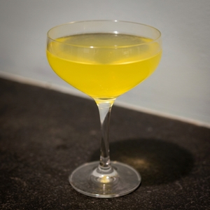 An image of the Almond Brother cocktail submitted by Toby that contains Reposado Tequila, Amaretto, Apricot Brandy, Lime, Orgeat Syrup and Maple Syrup