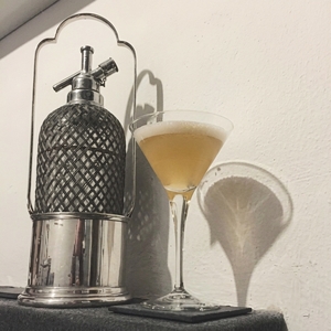 An image of the Ambassade cocktail submitted by Toby that contains Pineau des Charentes, London Dry Gin and Grand Marnier