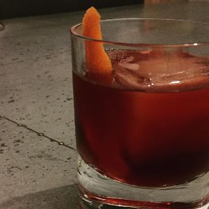 An Instagram of the Arbitrary Nature of Time cocktail submitted by n0tquitethere that contains Bourbon, Turin Bitters, Cherry Brandy, Orange Bitters, Xocolatl Mole Bitters and Orange