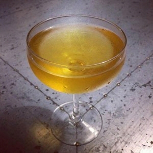 An image of the Autumn Sunset cocktail submitted by Toby that contains Swedish Flaggpunsch, Gold Rum and Passion Fruit Juice