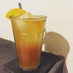 An Instagram of the Cadiz Collins cocktail submitted by n0tquitethere that contains Orange, Whiskey Barrel Aged Bitters, London Dry Gin, Amontillado Sherry, Lemon, Demerara Syrup and Soda Water