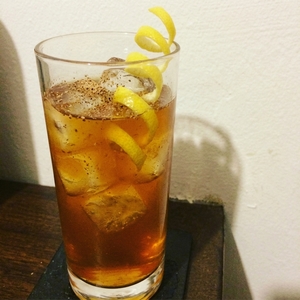An image of the Ciclope cocktail submitted by Toby that contains Amontillado Sherry, Apple Brandy, Averna, Honey Syrup, Lemon, Soda Water, Angostura Bitters, Nutmeg and Lemon