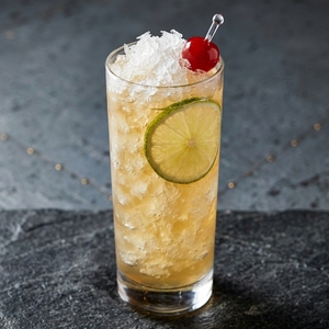 An image of the Death Bed cocktail submitted by Toby that contains Gold Rum, Agricole Rhum, Cherry Brandy, Lime, Pineapple Juice, Lime and Cocktail Cherry