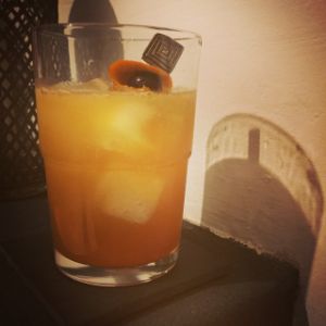 An Instagram of the Desert Healer cocktail submitted by n0tquitethere that contains London Dry Gin, Cherry Brandy, Orange, Ginger Ale, Orange and Cocktail Cherry