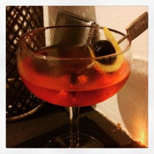 An Instagram of the El Corazon cocktail submitted by n0tquitethere that contains Reposado Tequila, Aperol, Sweet Vermouth, Cherry Bitters, Grapefruit and Cocktail Cherry