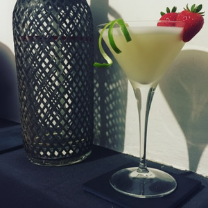 An image of the Fair Lady cocktail submitted by Toby that contains London Dry Gin, Orange, Lime, Egg, Crème de Fraise, Strawberries and Lime