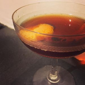 An Instagram of the Fire-Breathing Devil cocktail submitted by n0tquitethere that contains Sloe Gin, Dry Vermouth, Sweet Vermouth, Smith & Cross, Orange Bitters and Orange