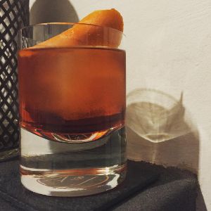 An Instagram of the Foreign Legion cocktail submitted by n0tquitethere that contains Gold Rum, Aperol, Dubonnet Rouge, Manzanilla Sherry, Crème de Cacao Blanc, Rhubarb Bitters and Orange