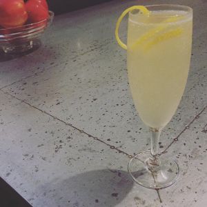 An Instagram of the The French 75 cocktail submitted by n0tquitethere that contains London Dry Gin, Lemon, Simple Syrup, Champagne, Lemon and Cocktail Cherry