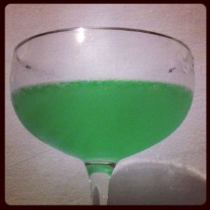 An Instagram of the Green Dragon cocktail submitted by n0tquitethere that contains Lemon, Kümmel, Crème de Menthe, London Dry Gin and Peach Bitters