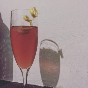 An Instagram of the Handbook For The Recently Deceased cocktail submitted by n0tquitethere that contains Bourbon, Falernum, Peychauds Bitters, Angostura Bitters, Prosecco and Lemon