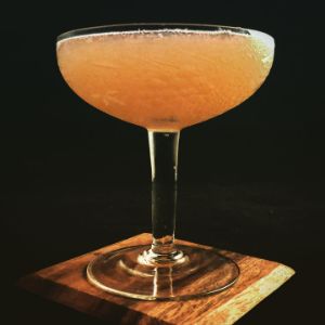 An Instagram of the Heirloom cocktail submitted by n0tquitethere that contains Old Tom Gin, Cynar, Lime, Strega, White Grapes and Absinthe