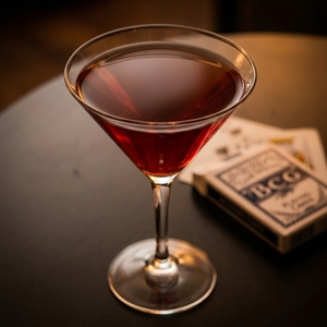 An image of the Kiss-in-the-Dark Cocktail cocktail submitted by Toby that contains London Dry Gin, Cherry Brandy and Sweet Vermouth