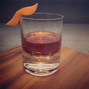 An Instagram of the Madame Mustache cocktail submitted by n0tquitethere that contains Agricole Rhum, Drambuie, Cynar, Angostura Bitters and Grapefruit