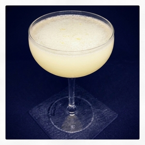 An image of the Maiden's Blush cocktail submitted by Toby that contains London Dry Gin, Lemon, Absinthe, Raspberry Syrup, Caster Sugar and Lemon