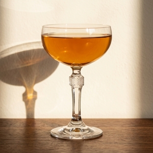 An image of the Persephone cocktail submitted by Toby that contains Applejack, Sweet Vermouth, Sloe Gin, Lemon and Simple Syrup