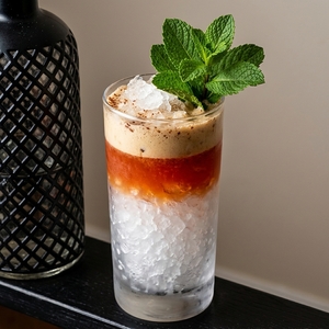 An image of the Pineapple Julep (Gin Variation) cocktail submitted by Toby that contains London Dry Gin, Orange, Pineapple, Raspberry Syrup and Mint