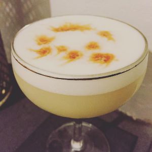 An Instagram of the Pisco Sour cocktail submitted by n0tquitethere that contains Pisco, Lime, Simple Syrup, Egg and Angostura Bitters