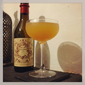 An image of the Royal Smile cocktail submitted by Toby that contains London Dry Gin, Apple Brandy, Grenadine and Lemon