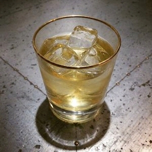 An image of the Rusty Cadillac cocktail submitted by Toby that contains Gold Rum, Galliano L'authentico, Crème de Cacao Blanc, Angostura Bitters and Egg