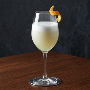 An image of the Spice King cocktail submitted by Toby that contains Malbec, Pisco, Lime, Simple Syrup, Hellfire Bitters, Xocolatl Mole Bitters and Orange