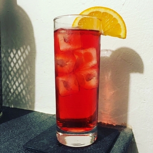 An image of the The Morocco cocktail submitted by Toby that contains Curaçao Triple Sec, Dry Vermouth, Coriander Syrup, Angostura Bitters and Orange