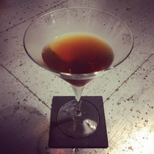 An image of the TNT cocktail submitted by Toby that contains Absinthe and Rye Whiskey