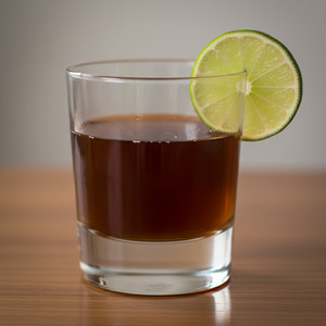 An image of the Virgin's Prayer cocktail submitted by Toby that contains White Rum, Dark Rum, Coffee Liqueur, Lemon, Orange and Lime
