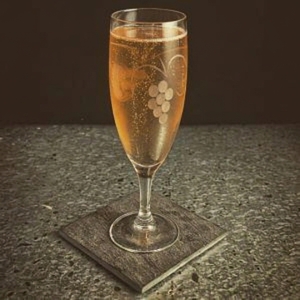 An image of the Well Baked Tart cocktail submitted by n0tquitethere that contains Cherry Brandy, Amaretto and Champagne