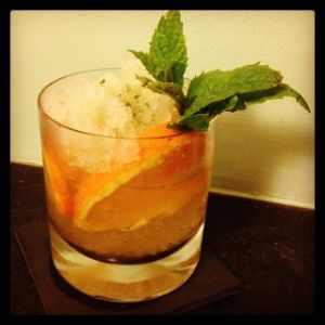 An Instagram of the Whiskey Smash cocktail submitted by n0tquitethere that contains Orange, Mint, Mint Syrup, Rye Whiskey and Mint