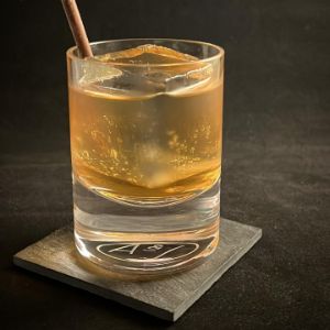 An Instagram of the White Chocolate Sazerac cocktail submitted by n0tquitethere that contains Armagnac, Bourbon, Crème de Cacao Blanc, Gomme Syrup and Chocolate Pencil