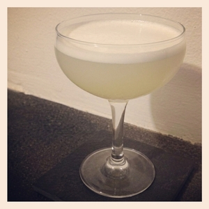 An image of the Wig In A Box cocktail submitted by Toby that contains London Dry Gin, Sweet Vermouth, Apricot Brandy, Lemon and Lemon